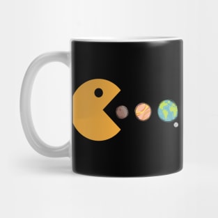 Pacman swallowing planets Mug